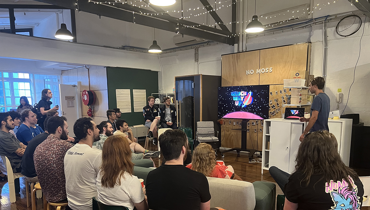 Photograph of Nick presenting about Which Way Up.